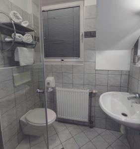 Koupelna v ubytování Hotel Bajt Maribor