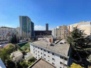 a view of a city with tall buildings at Queens Luxury Apartments Tirana in Tirana
