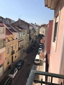 a view of a city street with parked cars at NEW Cosy & Charming Apartment in Campolide - 3A in Lisbon