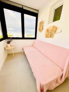 Postel nebo postele na pokoji v ubytování Casa de Los Soles