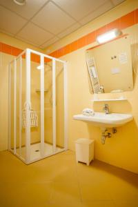 Koupelna v ubytování Hotel Foresteria + 37 fotografií