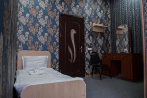 Postelja oz. postelje v sobi nastanitve HOTEL SV