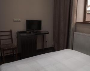 Postelja oz. postelje v sobi nastanitve HOTEL SV