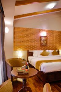 Letto o letti in una camera di Hotel Bhadgaon
