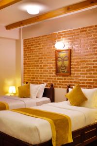 Letto o letti in una camera di Hotel Bhadgaon
