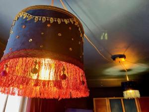 a chandelier that is hanging from a ceiling at Hotel Pelirocco in Brighton & Hove