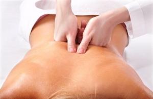 a man getting a back massage from a woman at Giosifaki in Vari