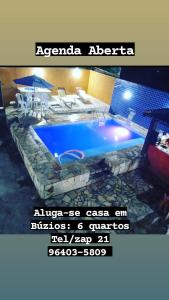 una foto de una piscina en una casa en Casa Buzios moreira campos, en Búzios