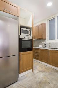 A cozinha ou kitchenette de Athena's Nest- *best Location* A/C +HEAT!