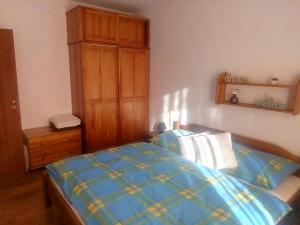 Posteľ alebo postele v izbe v ubytovaní SKI&SUN - Apartmán B11