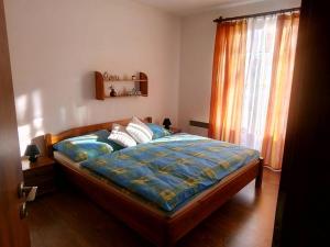 Posteľ alebo postele v izbe v ubytovaní SKI&SUN - Apartmán B11