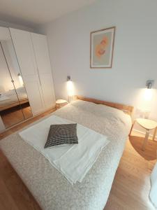 Posteľ alebo postele v izbe v ubytovaní Apartament Green Estate