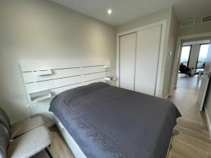 Posteľ alebo postele v izbe v ubytovaní BM5A, Gran ático duplex con dos terrazas cerca el mar