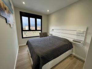 Posteľ alebo postele v izbe v ubytovaní BM5A, Gran ático duplex con dos terrazas cerca el mar