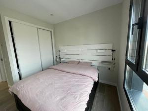 Posteľ alebo postele v izbe v ubytovaní BM5A, Gran ático duplex con dos terrazas cerca el mar