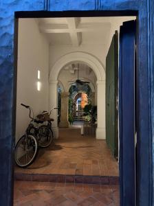 a bike parked in the hallway of a building at Loft en Casa Colonial del Centro Histórico de Cartagena in Cartagena de Indias