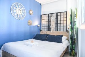 Posteľ alebo postele v izbe v ubytovaní Bail mobilité - Studio cosy avec terrasse et vue