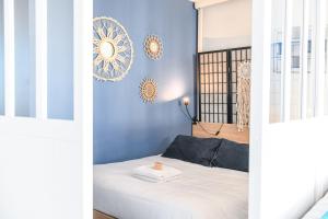 Posteľ alebo postele v izbe v ubytovaní Bail mobilité - Studio cosy avec terrasse et vue