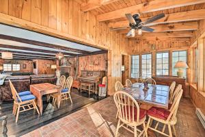 a dining room with a table and chairs at All Year-Round Retreat Near Windham Mountain 