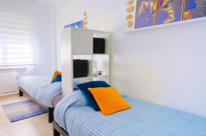 Postel nebo postele na pokoji v ubytování Raíz Azul, próximo a Salinas
