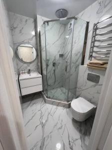 Koupelna v ubytování Deluxe apartments - Viva Ukraine