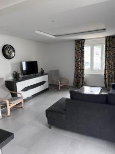 Televízia a/alebo spoločenská miestnosť v ubytovaní Appartement brest st-marc 6-8personne 2min centre