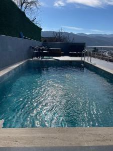 The swimming pool at or close to WHİTE ROSE VİLLA Jakuzili ve Isıtma Havuzlu