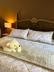 Postel nebo postele na pokoji v ubytování Tres Fuentes Hotel Boutique