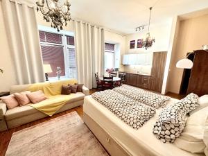 Ένα ή περισσότερα κρεβάτια σε δωμάτιο στο Home Away main square apartment
