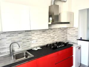 A kitchen or kitchenette at Appartamento Le Risaie