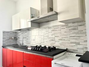 A kitchen or kitchenette at Appartamento Le Risaie
