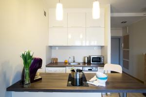 O bucătărie sau chicinetă la Studio Centrum