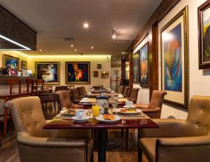 Uma área de estar em Studio Hotel Boutique