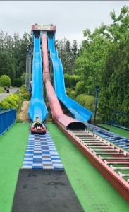 a slide at a water park with a boat on it at Villa Lahr in Lahr