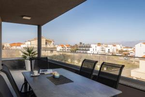 Balkón alebo terasa v ubytovaní Apartments Cesare