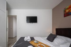 Posteľ alebo postele v izbe v ubytovaní Apartments Cesare