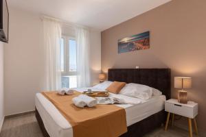 Posteľ alebo postele v izbe v ubytovaní Apartments Cesare