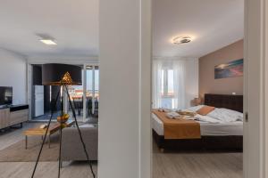 Posteľ alebo postele v izbe v ubytovaní Apartments Cesare