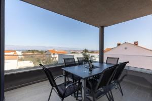 Balkón alebo terasa v ubytovaní Apartments Cesare