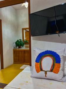 TV a/nebo společenská místnost v ubytování Pousada Casa Sítio Delícia do Quadrado