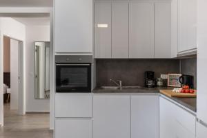 Kuchyňa alebo kuchynka v ubytovaní Apartments Cesare