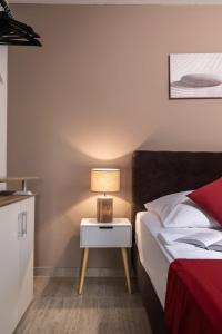Posteľ alebo postele v izbe v ubytovaní Apartments Cesare
