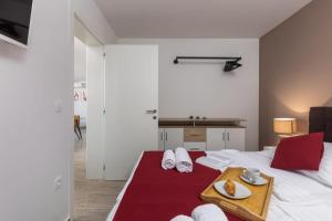 Posteľ alebo postele v izbe v ubytovaní Apartments Cesare