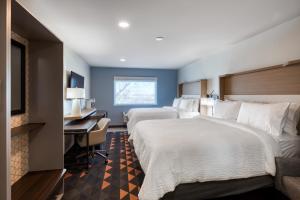 Postel nebo postele na pokoji v ubytování Holiday Inn Kansas City - Downtown by IHG