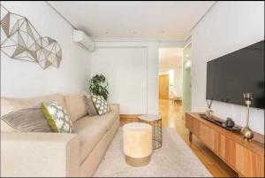 A television and/or entertainment centre at Luxury Old TownGeneral Jauregi AC
