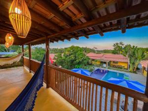 Bazén v ubytování Pousada Casa Sítio Delícia do Quadrado nebo v jeho okolí