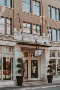 a hotel rating sign on the front of a building at Hotel Rialto in Victoria