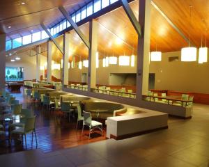 a dining area with tables and chairs in a building at Aranwa Sacred Valley Hotel & Wellness in Urubamba