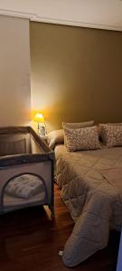 Un pat sau paturi într-o cameră la Relax! en Galicia disfruta de playa y Montaña