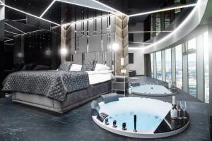 Posteľ alebo postele v izbe v ubytovaní In The Sky - Apartamenty w Sky Tower
